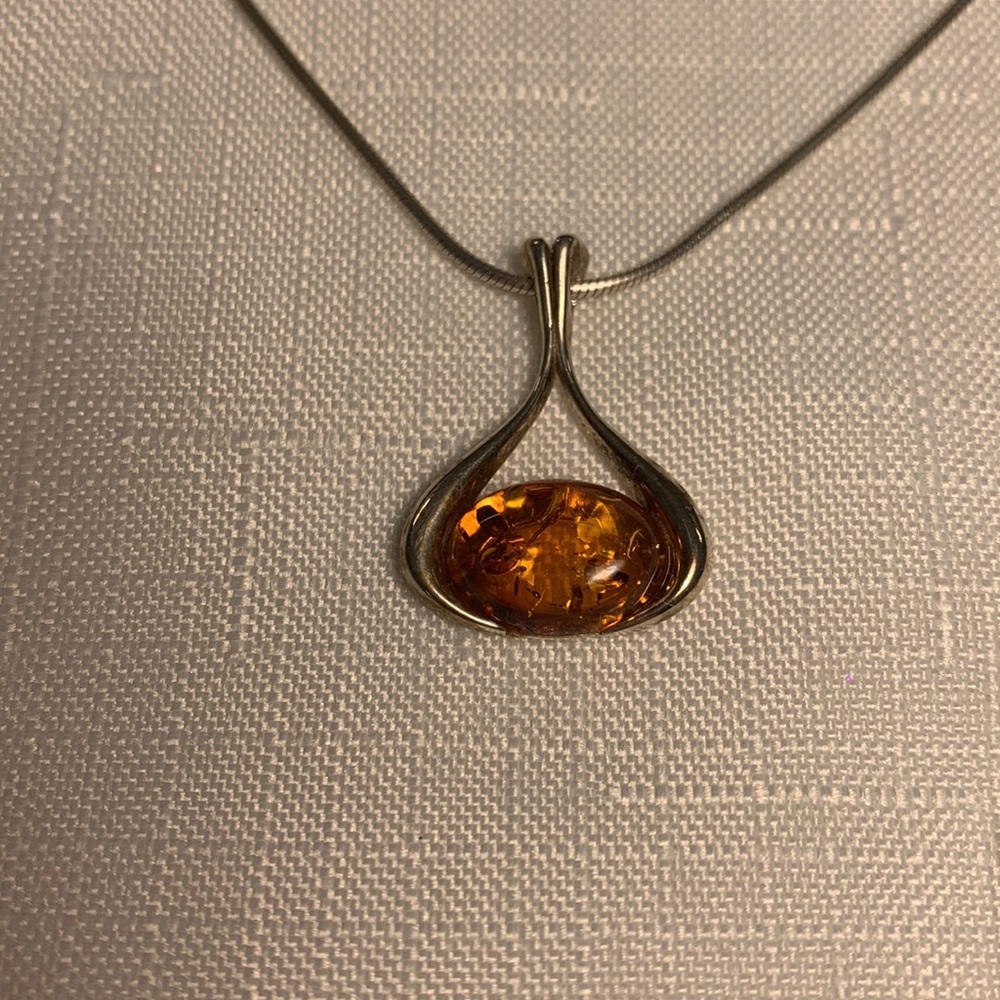 Sterling silver setting with Amber-colored stones necklace and earring set